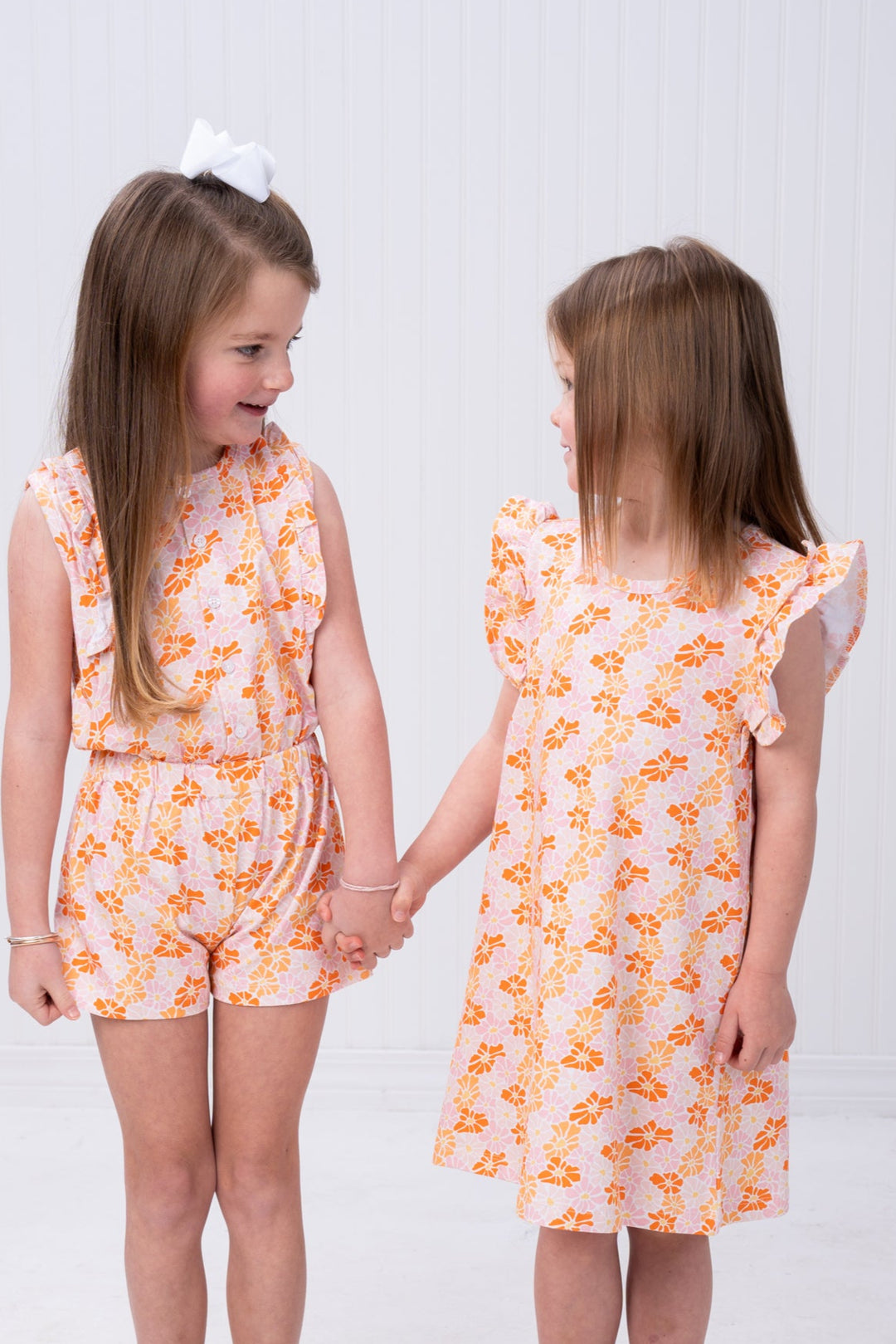 Kinsley Peachy Pink Florals Romper