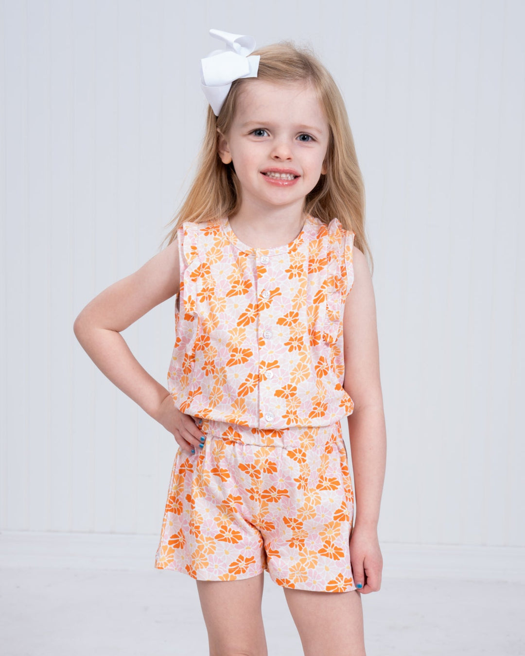 Kinsley Peachy Pink Florals Romper