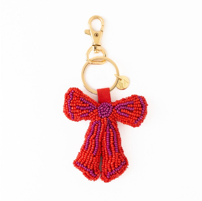 Violet beaded bow bag charm red