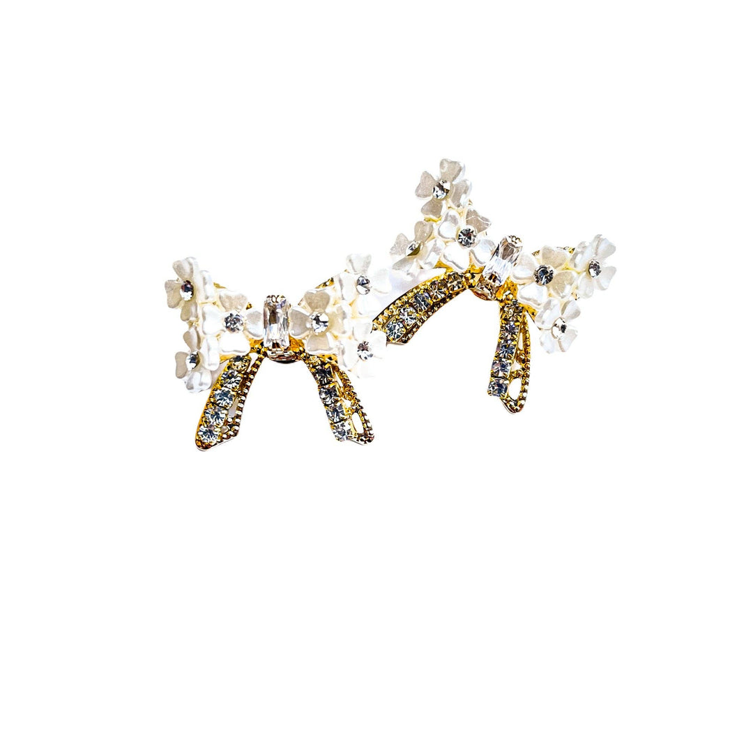 THE ACCESSORY SCOUT - Pearly Bow Studs