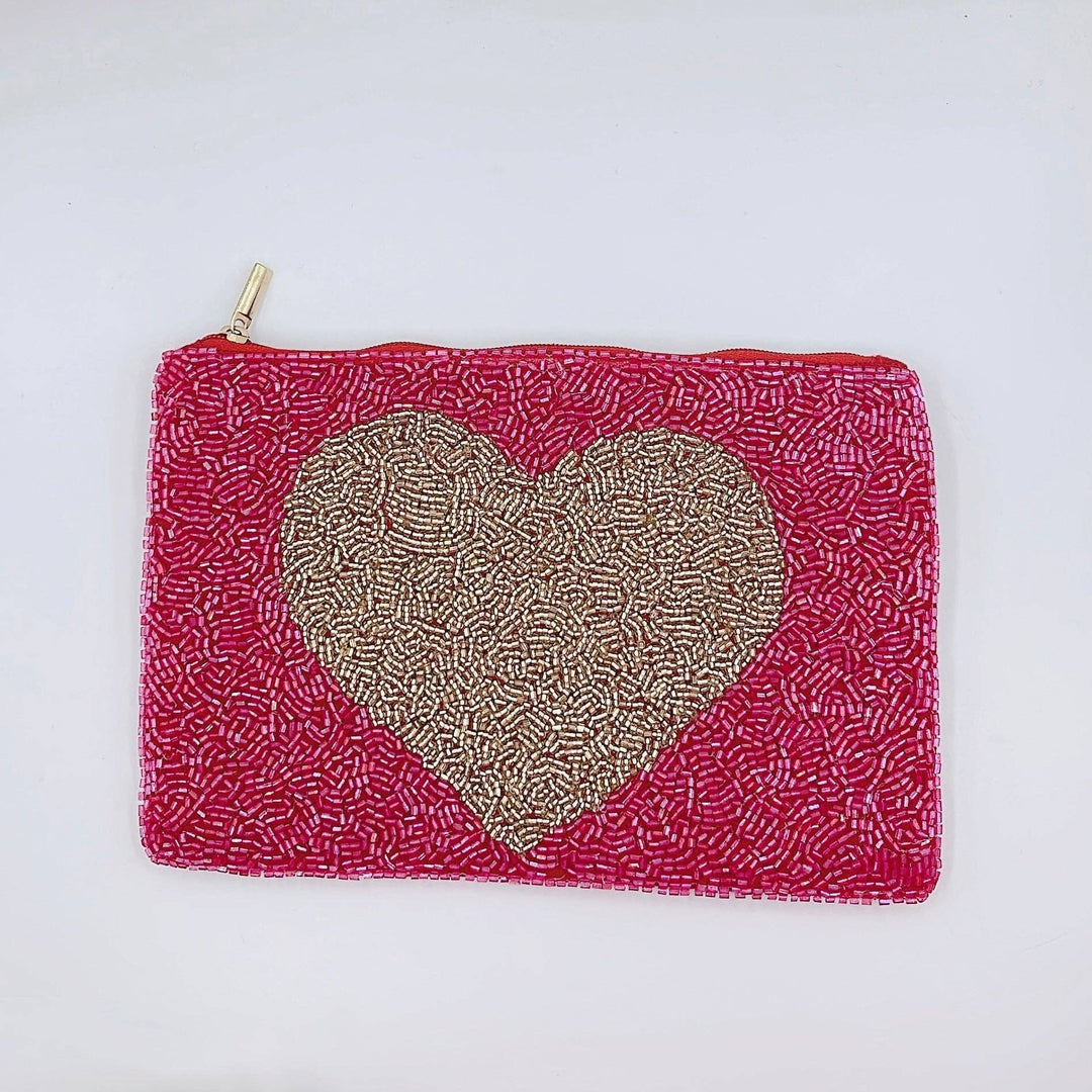 DOORBUSTER Treasure Jewels Inc. - Gold heart pouch