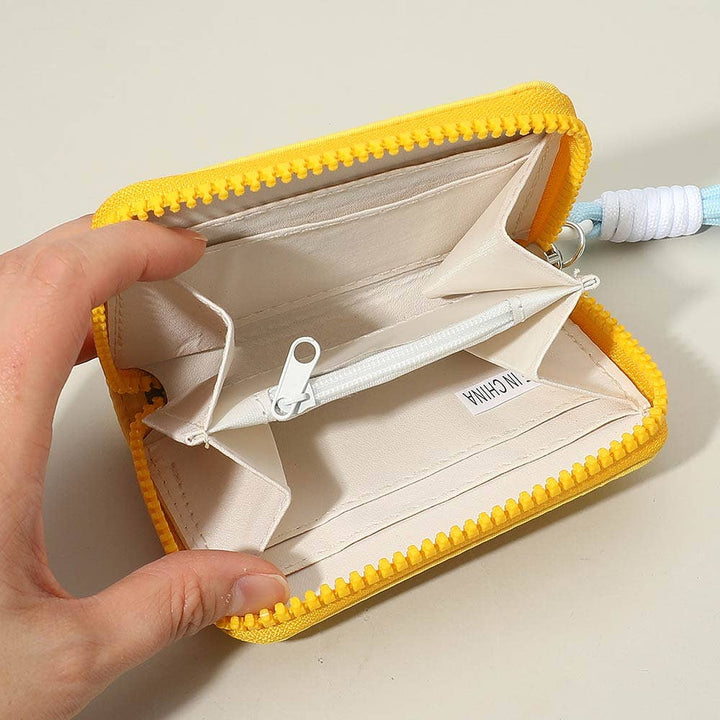Sensibling Corp. - Compact Zip Around Mini Wallet: Pink