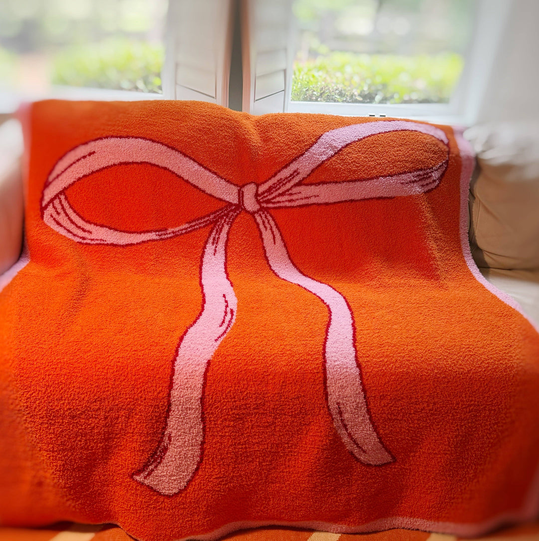 Ellison+Young - My Only Bow Coziest Blanket: Orange/Pink