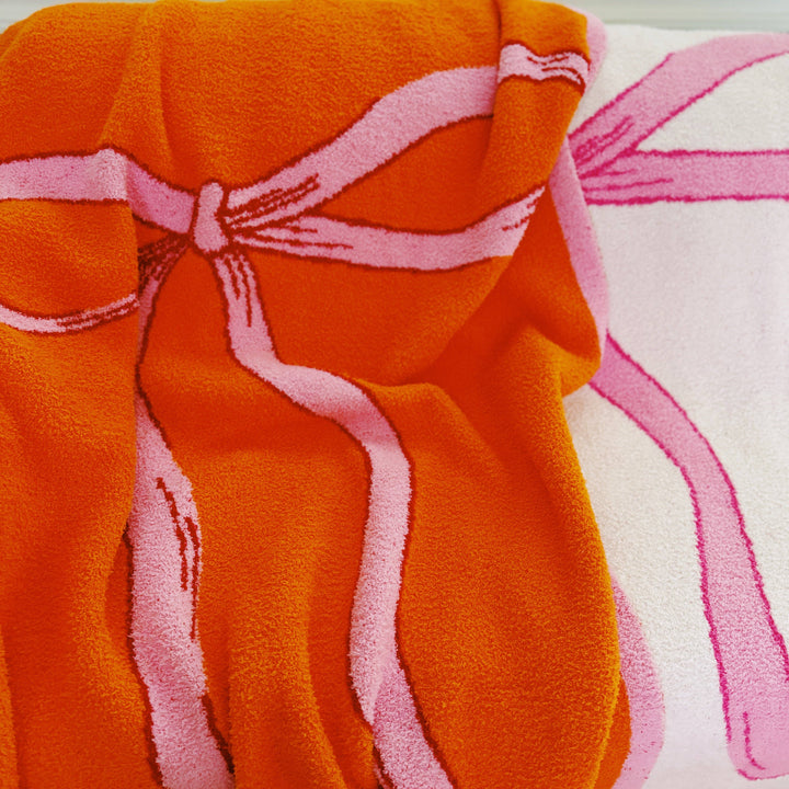 Ellison+Young - My Only Bow Coziest Blanket: Orange/Pink
