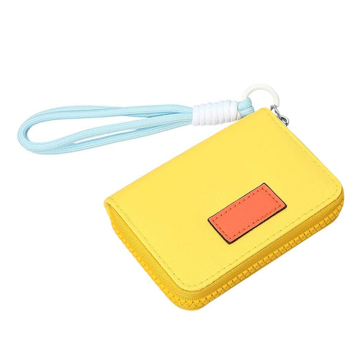 Sensibling Corp. - Compact Zip Around Mini Wallet: Purple