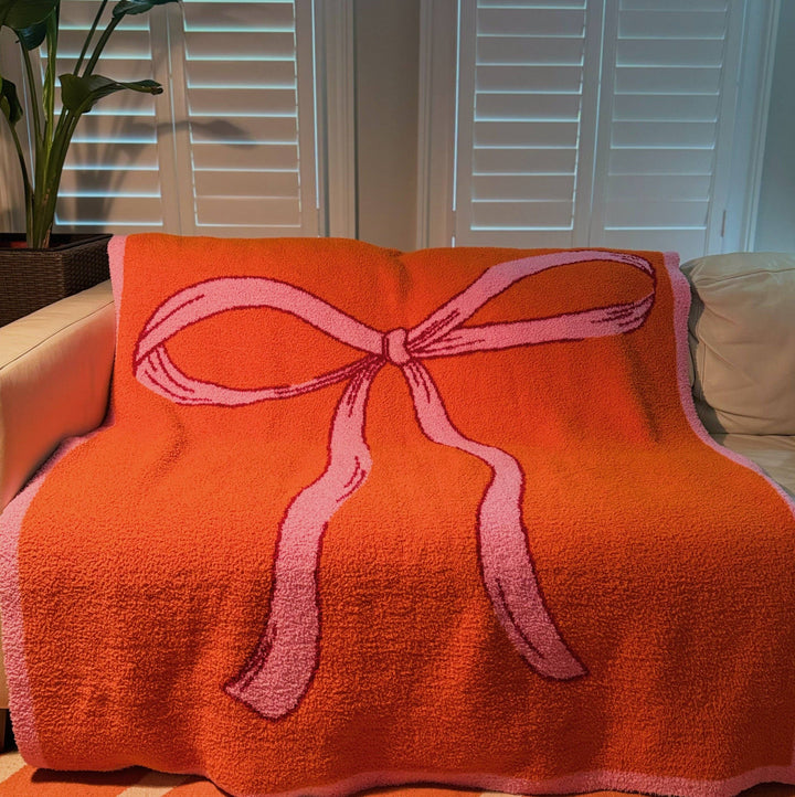 Ellison+Young - My Only Bow Coziest Blanket: Orange/Pink