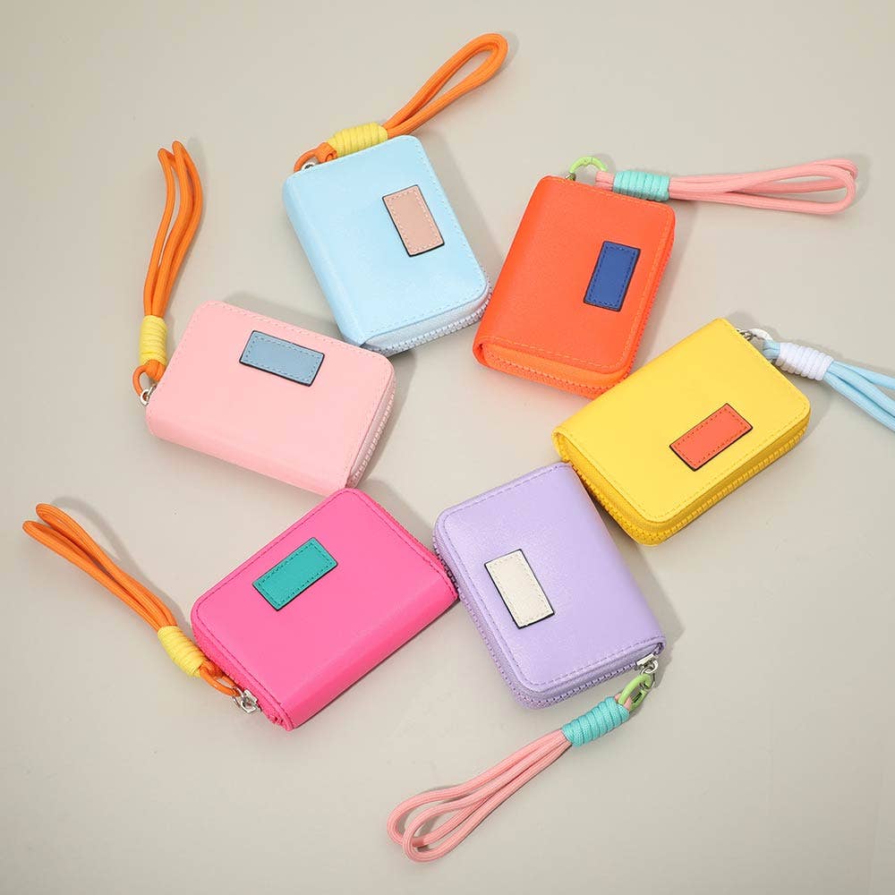 Sensibling Corp. - Compact Zip Around Mini Wallet: Pink