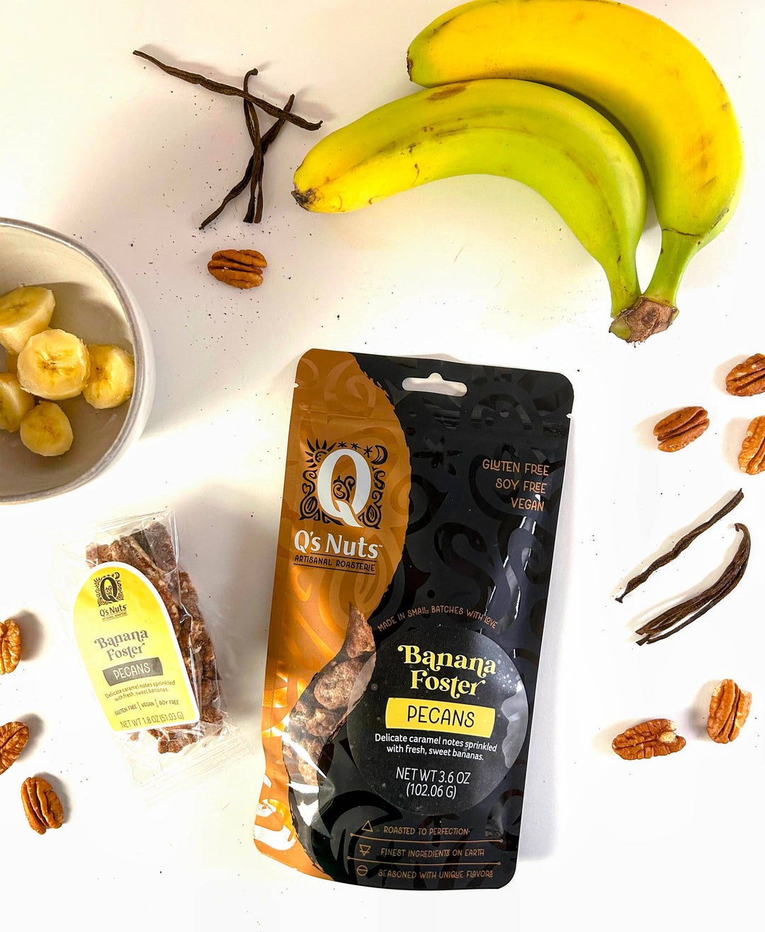 Q's Nuts, LLC - 1.8 oz Banana Foster Pecan