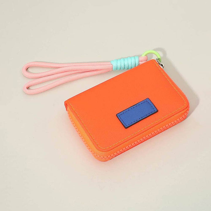 Sensibling Corp. - Compact Zip Around Mini Wallet: Pink