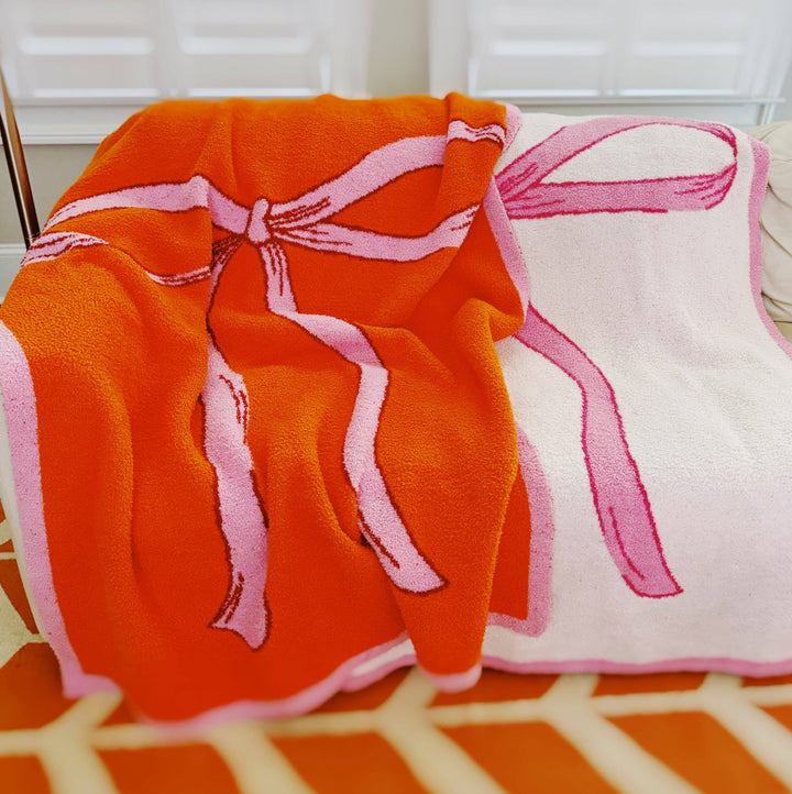 Ellison+Young - My Only Bow Coziest Blanket: Orange/Pink