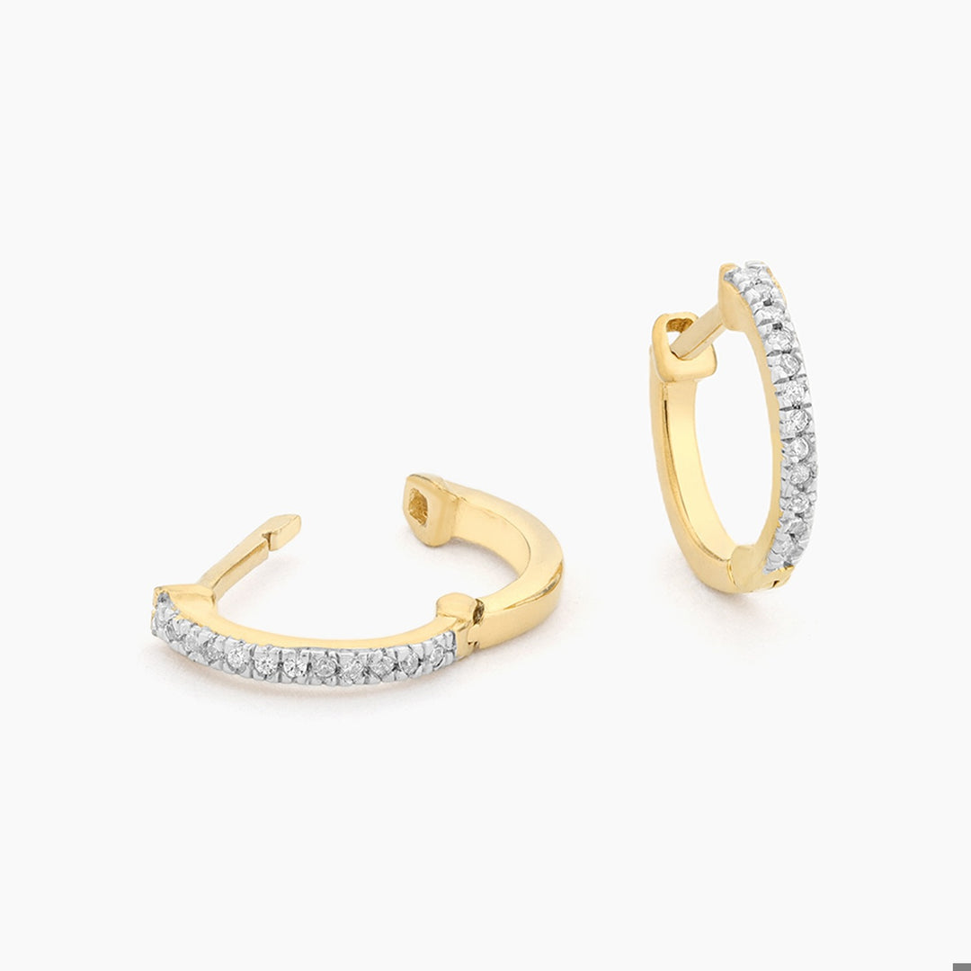 Gold Half-Hearted Adventure Huggie Earrings