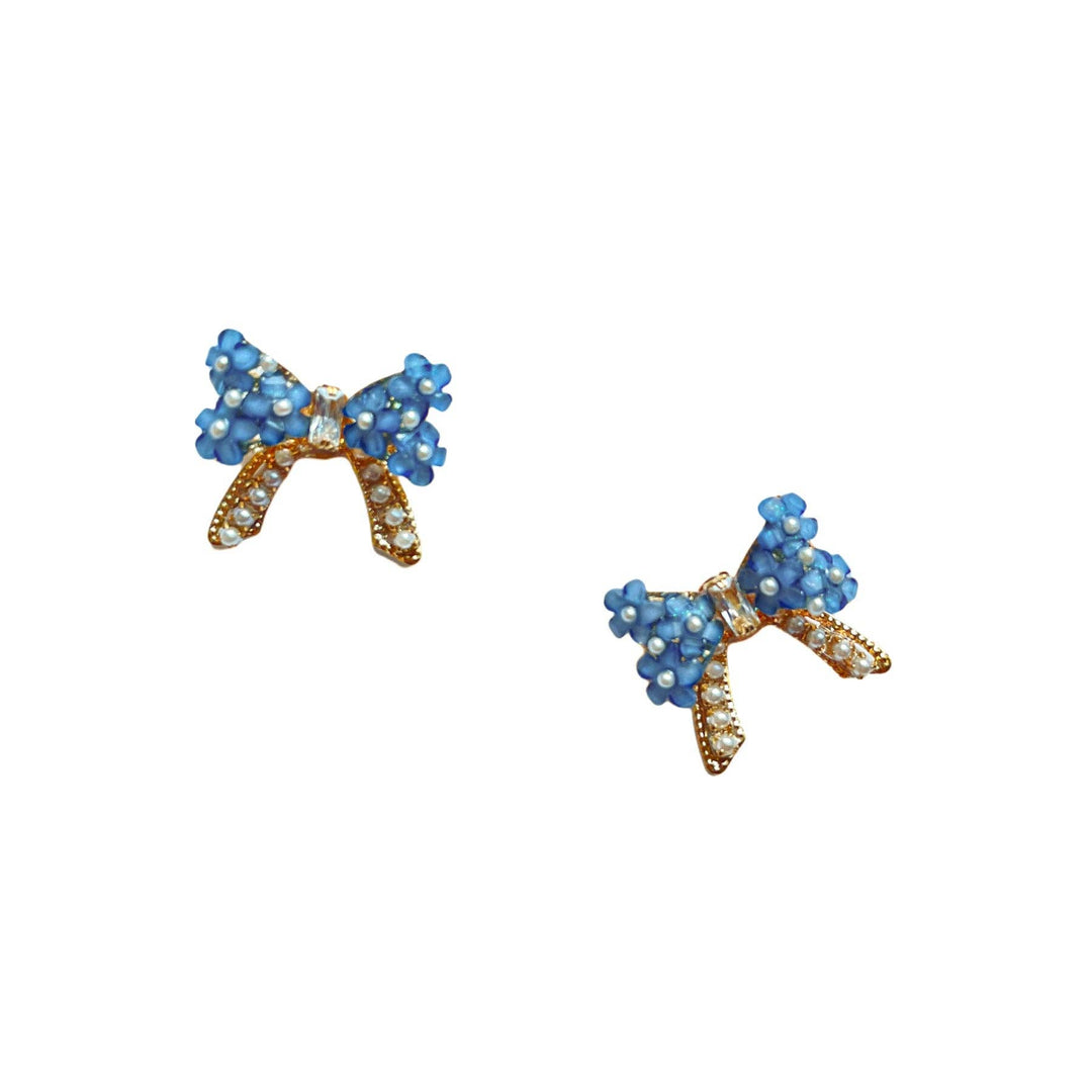 THE ACCESSORY SCOUT - Blue Flower Bow Studs
