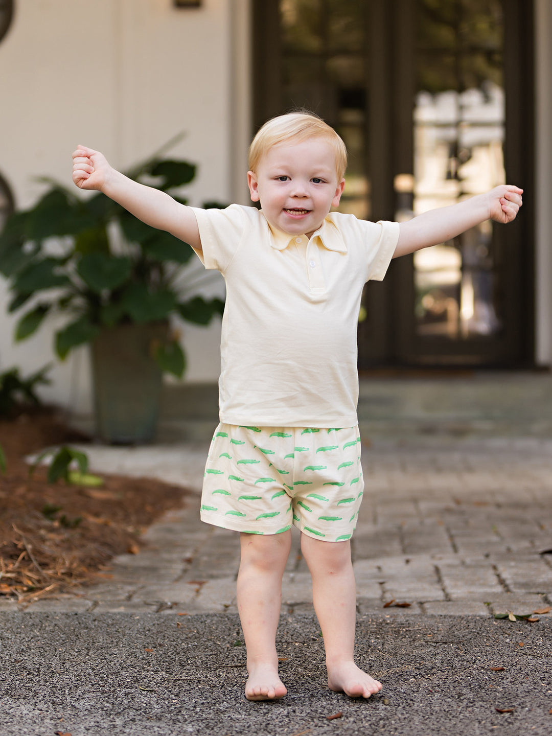 A set of clothes for a little cheerful boy for the summer 8926494